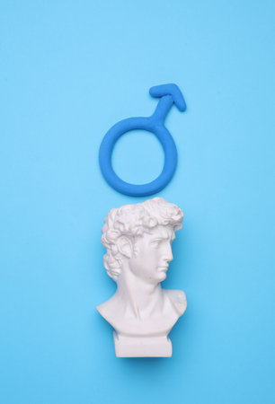 David bust with male gender symbol on blue backgroundの写真素材