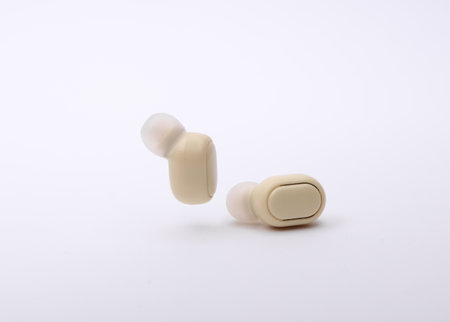 Wireless earbuds on white backgroundの写真素材