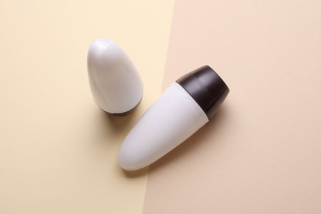 White antiperspirant tube sticks on pastel backgroundの写真素材