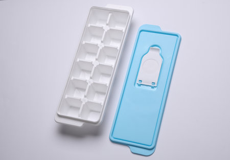 Plastic Ice Cube Maker Tray on White Backgroundの写真素材