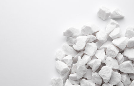 Many White Pebbles on White Backgroundの写真素材