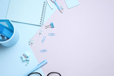 Blue Stationery set with paper sheets on gray background. Back to school, education, office supplies. Flat lay. Top view. Creative layoutの写真素材