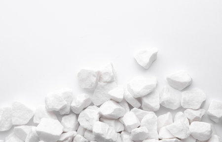 Many White Pebbles on White Backgroundの写真素材