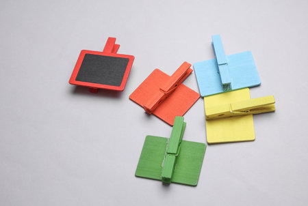 Chalkboard for notes on clothespin, gray backgroundの写真素材