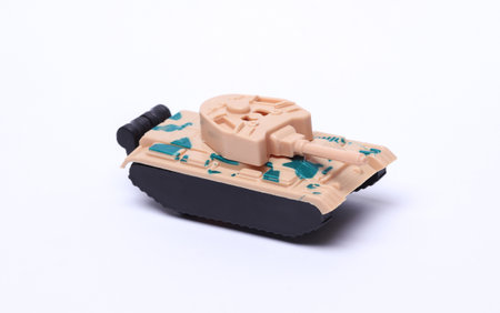 Plastic toy tank on a white backgroundの写真素材