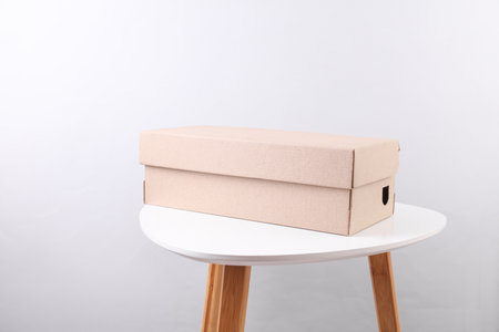Cardboard shoe box on a table