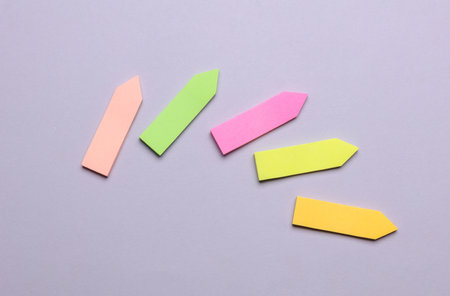 Various blank paper multicolored stickers. Sticky note collection on gray backgroundの写真素材