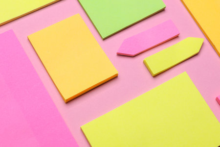 Various blank paper multicolored stickers. Sticky note collection on blue backgroundの写真素材