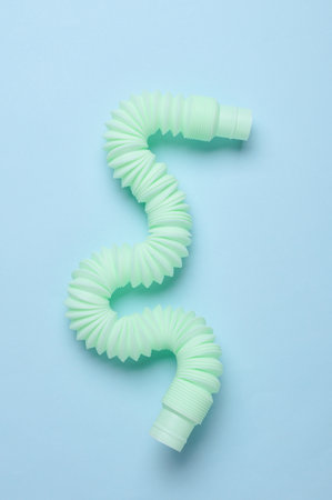 Plastic Pop tube on blue background