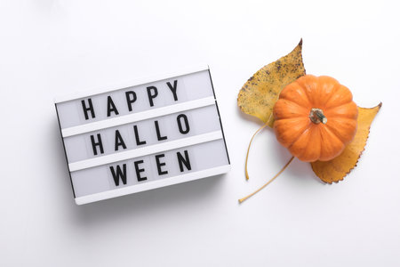 Lightbox with text HAPPY HALLOWEEN and decor. Halloween celebration. Flat layの写真素材