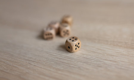 set of wooden dice on the tableの写真素材