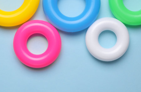 Plastic rings of children's pyramid on blue background