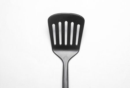Black kitchen spatula on white backgroundの写真素材