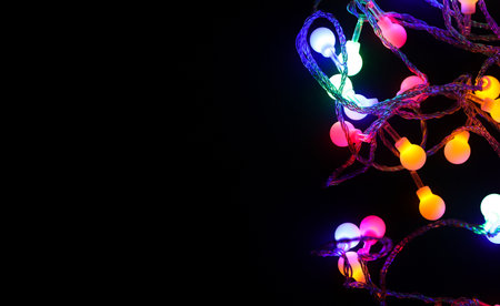 RGB LED multicolored garland lights on black background