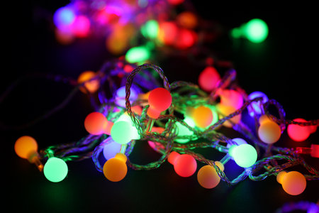 RGB LED multicolored garland lights on black background