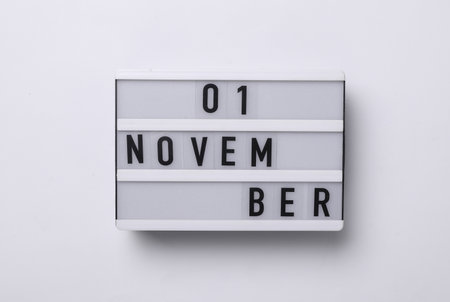 1 november letterboard text on Lightbox, white background. Seasonal calendar. Flat lay. Top viewの写真素材