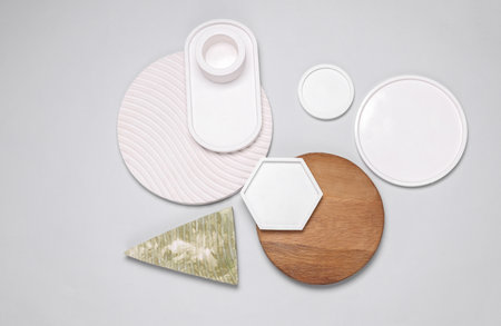 Composition of plaster and wooden figures. Moodboard for design. Top view. Flat lay