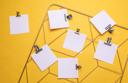 White square memo cards mockups attached to gold grid mood board on yellow background