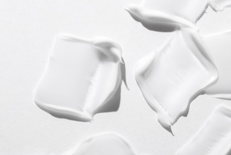 Shape and texture of white cream strokes. Beauty concept