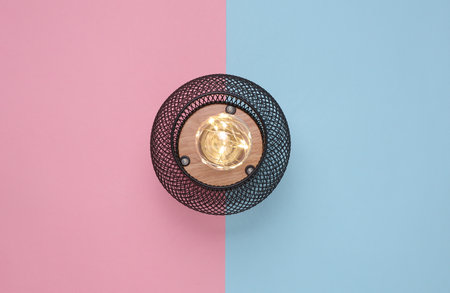 Loft lamp on pink blue background. Top viewの写真素材