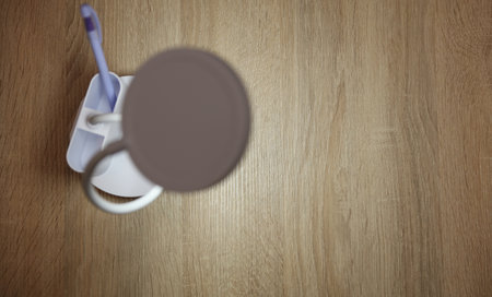 Modern led lamp illuminates empty tableの写真素材