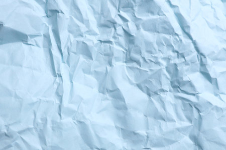 Crumpled blue paper background. Natural textureの写真素材