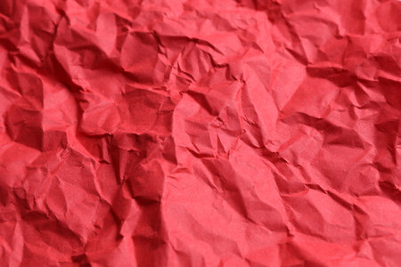 Crumpled red paper background. Natural textureの写真素材