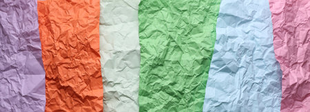 Lots of crumpled colored paper sheets with expressive textureの写真素材