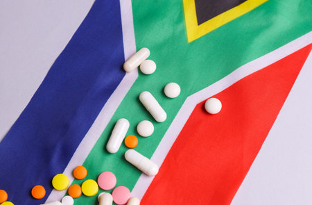 South Africa flag and pills. Concept of health careの写真素材