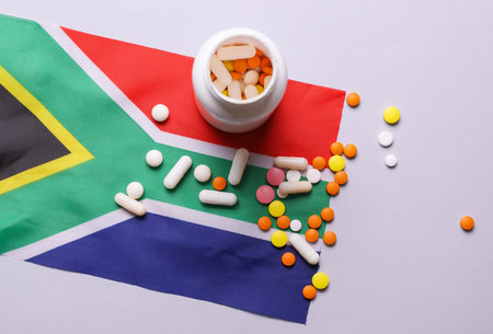 South Africa flag and pills. Concept of health careの写真素材