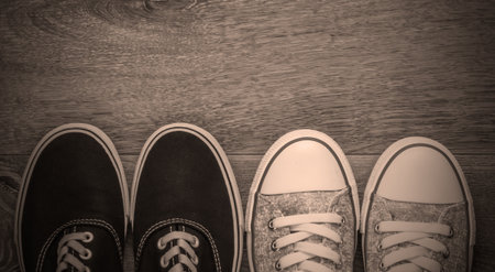 Fashionable stylish sneakers on the floor. Top viewの写真素材