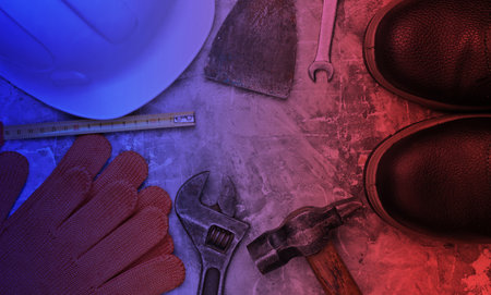 Safety equipment and work tool in neon light. Top view.の写真素材