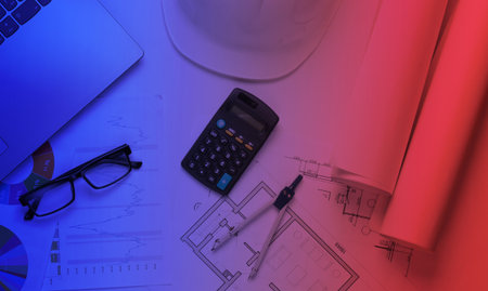 Engineering and construction equipment in red blue neon lightの写真素材