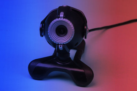 Webcam close-up in neon light.の写真素材