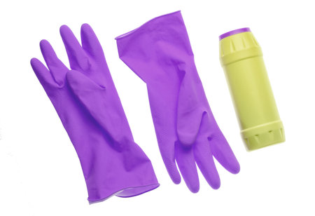 Rubber gloves for cleaning, bottle of detergent isolated on white backgroundの写真素材