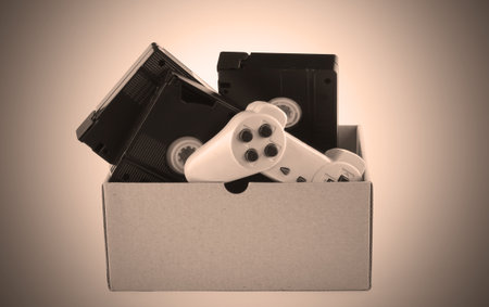 Cardboard box with retro items. Retro effect