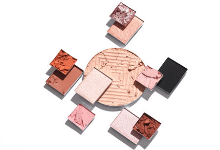 Crushed eyeshadow for makeup. Cosmetic product sample on white background. Creative layout. Beauty...