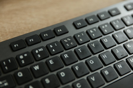 Computer keyboard close up on table