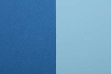 Creative background layout with colored sheets of paper in blue tones