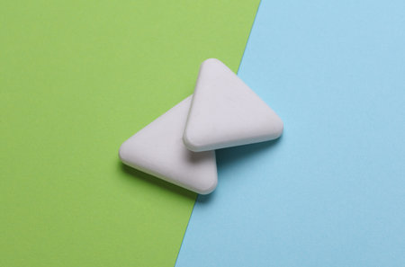 Erasers on a blue green background. Stationery school suppliesの写真素材