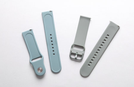 Silicone straps for smart watches and or bracelets on a white background
