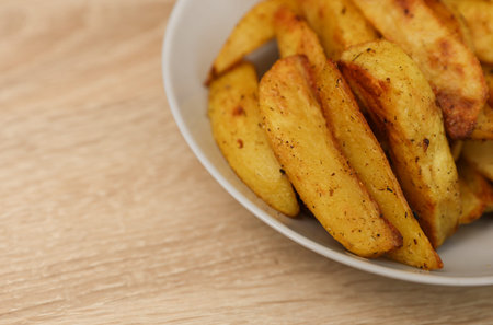 Fried potatoes peasant style on a plate