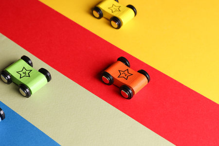 Simple children's cars on colored background.の写真素材