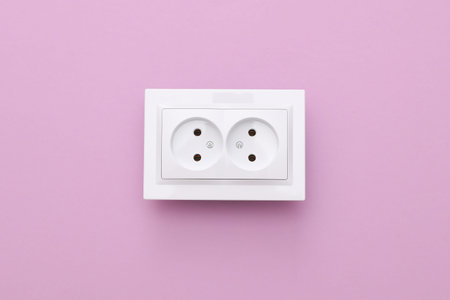 Double electrical socket on purple backgroundの写真素材