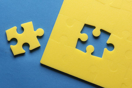 Yellow puzzle pieces. Teamwork, business concept
