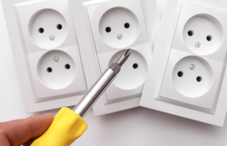 Electrical outlet repair concept. Electrician's workの写真素材