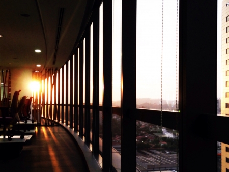 Sun setting through the officeの素材