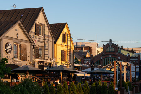 Oulu, Finland - June 2020: market square with cafes and restaurants, warm evening sunlightのeditorial素材