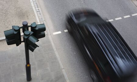 Vehicle at a traffic light in city traffic, Hamburg, Germanyの写真素材