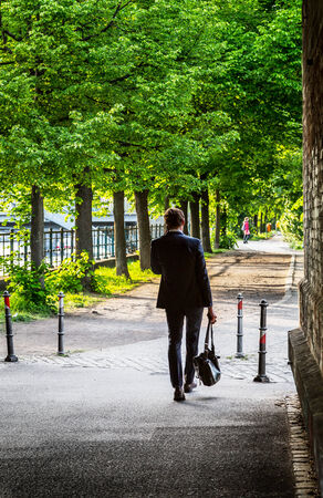 Man on the phone in the parkの写真素材